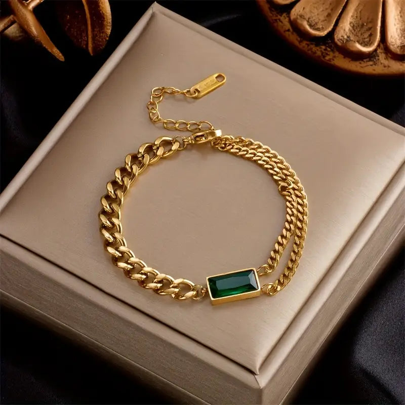 Bracelet en or avec fermoir et émeraude