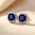 Boucles d'oreilles en argent avec saphir Halo