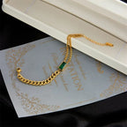 Bracelet en or avec fermoir et émeraude