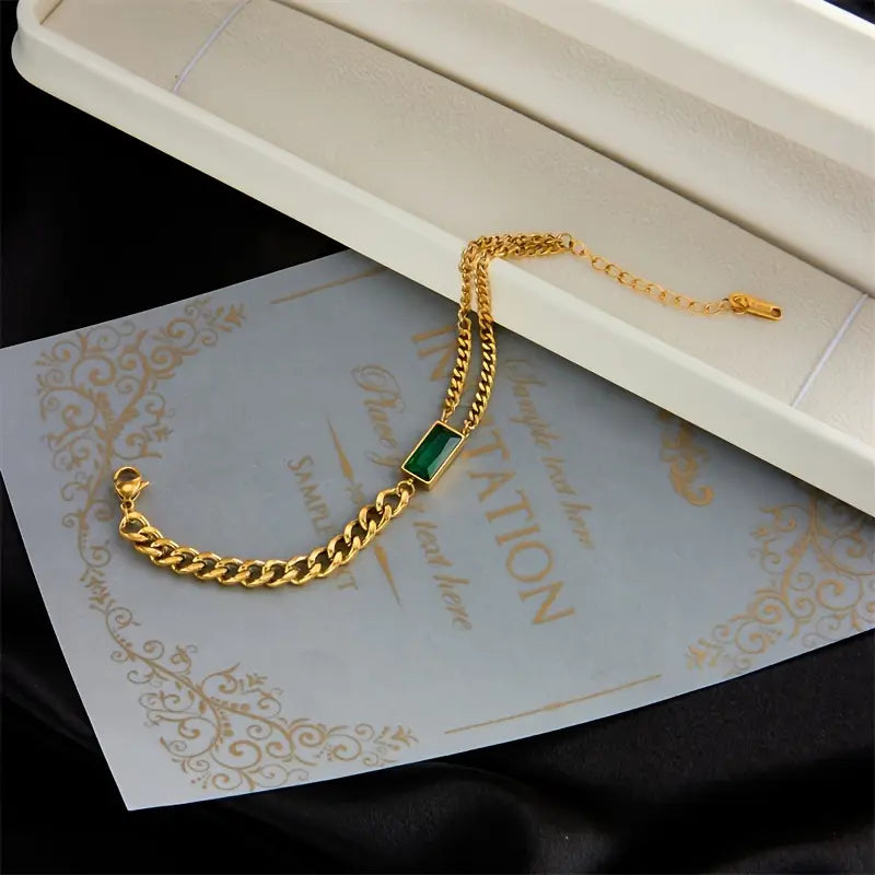 Bracelet en or avec fermoir et émeraude