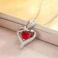 Collier en argent avec pendentif en forme de cœur en rubis