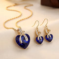 Set de bijoux : collier et boucles d'oreilles en or avec cœur en saphir