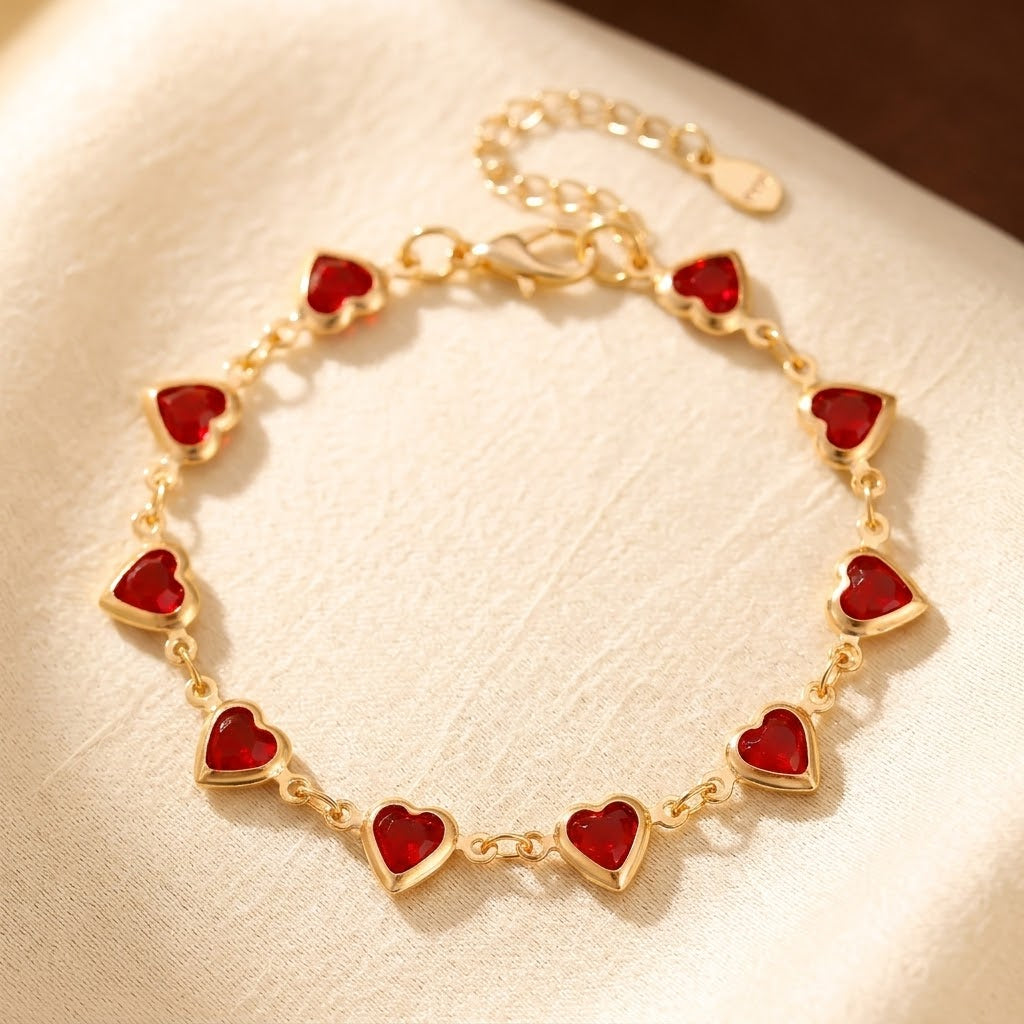 Bracelet en or orné d'un rubis en forme de cœur