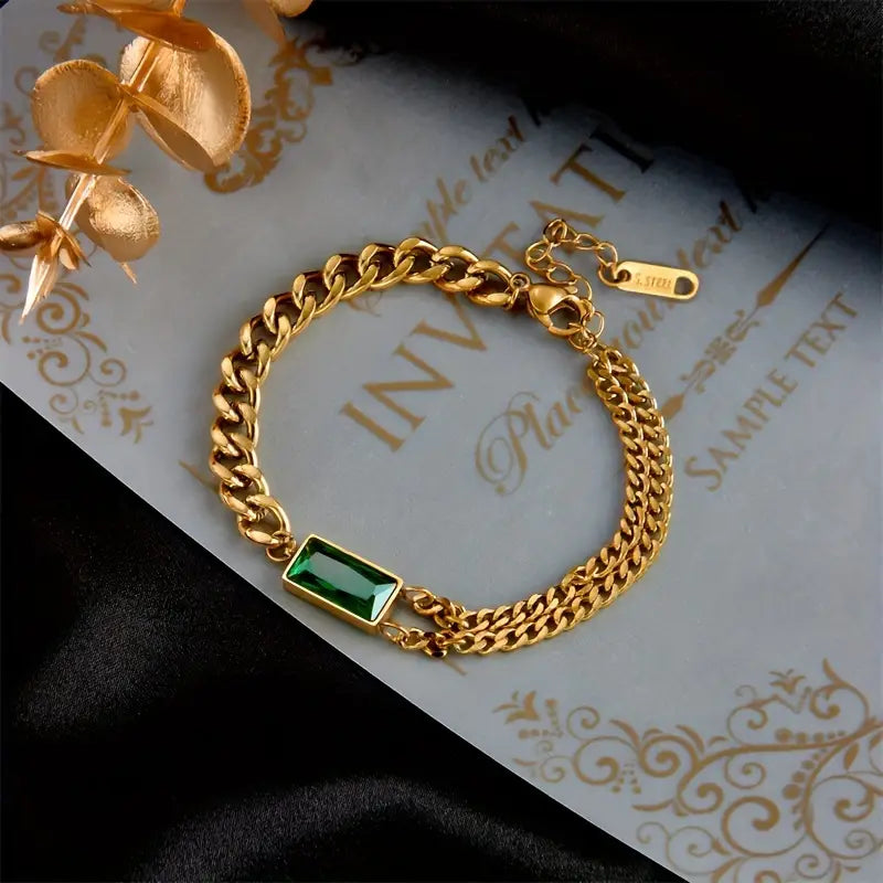 Bracelet en or avec fermoir et émeraude